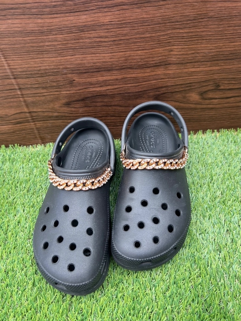 CROCS Black Clogs with Rose Gold Chain Accent